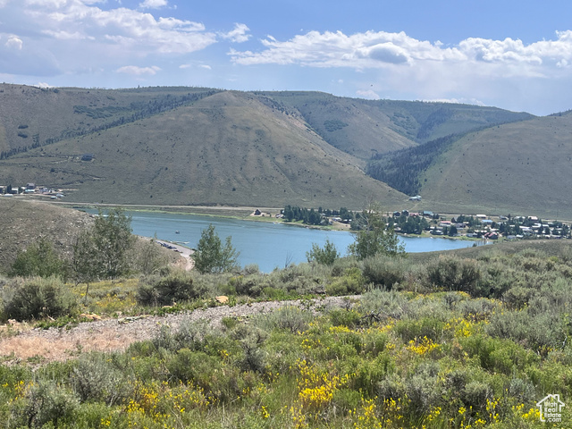 View of mountain feature with a water view