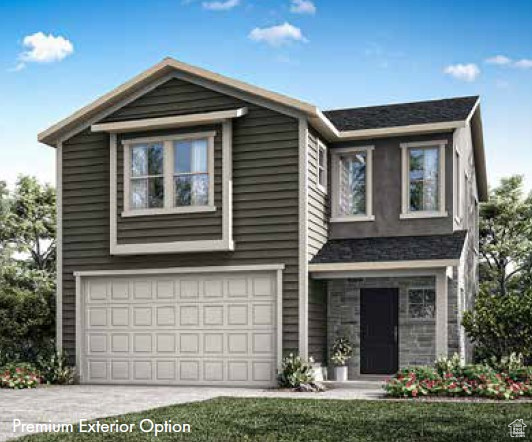 View of front of home featuring a garage