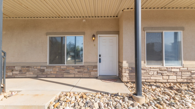 Entrance to property with a patio area