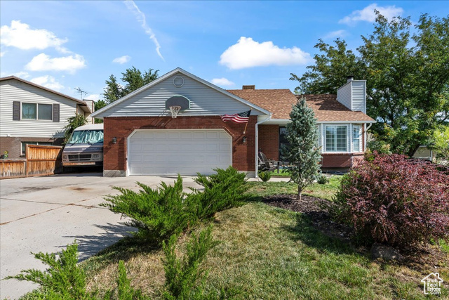 View of front of home featuring a garage