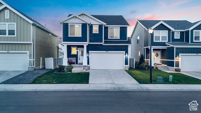 View of front of home with a garage