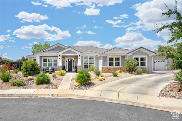 View of front of property with a garage