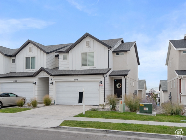 View of front facade with a garage