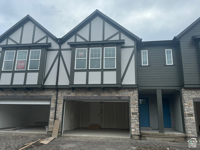 View of front facade with a garage