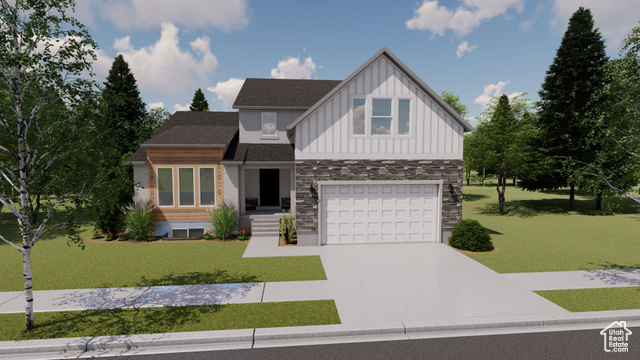 View of front of home with a front lawn and a garage