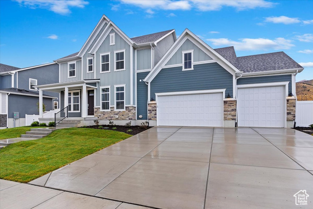 Craftsman-style house with a garage