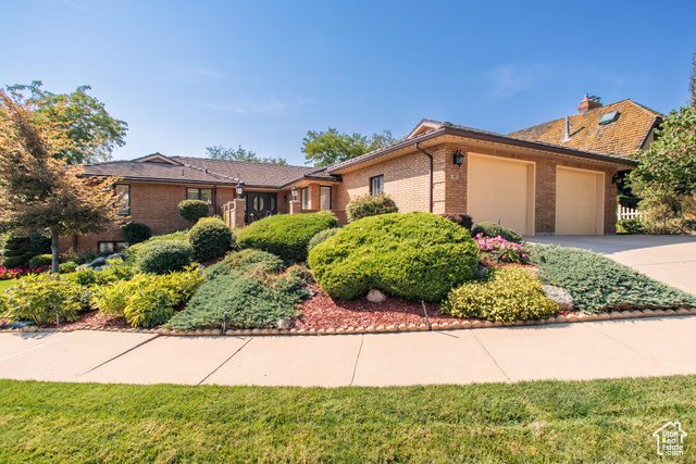 Ranch-style home with a garage