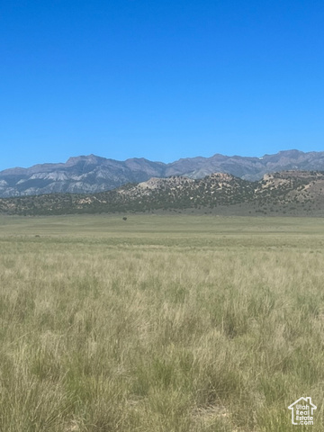 View of mountain feature with a rural view