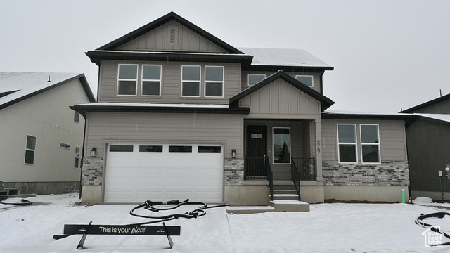 View of front of house with a garage