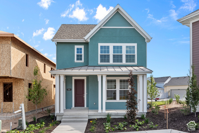 View of front of home featuring covered porch