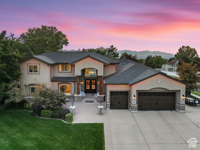 View of front of property featuring a yard