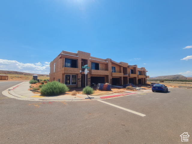 View of building exterior featuring a mountain view