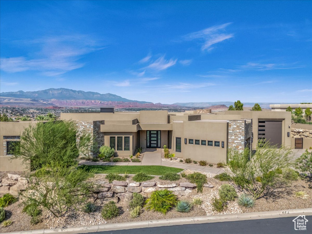 Adobe home featuring a mountain view