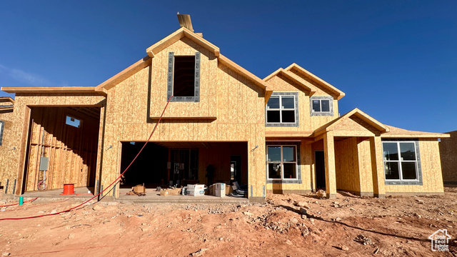 Property in mid-construction featuring a garage