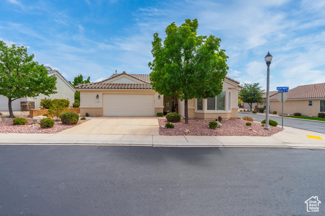 View of front of property with a garage