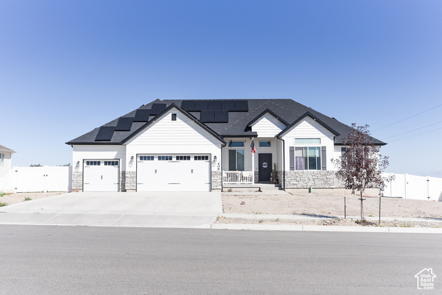 Craftsman inspired home with a garage