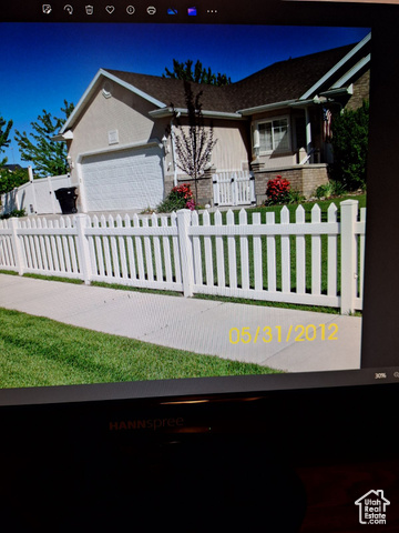 View of front of home featuring a garage