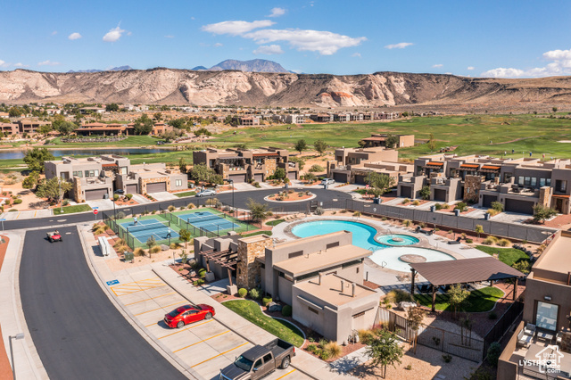 View of pool featuring a mountain view and a patio