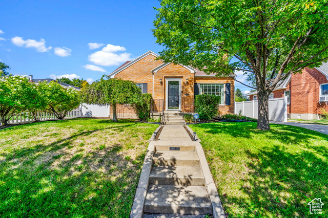 View of front of home with a front lawn