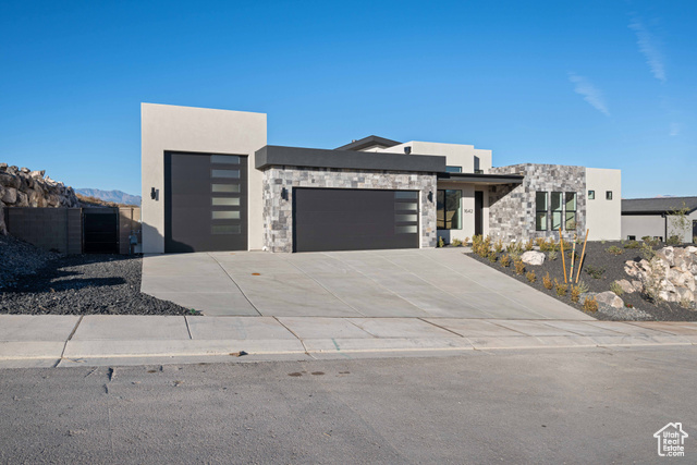 View of front of property with a garage