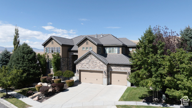 View of front of house with a garage