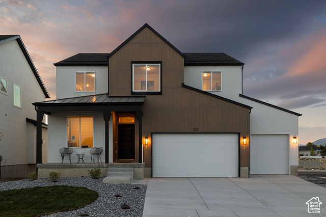 View of front facade with a garage