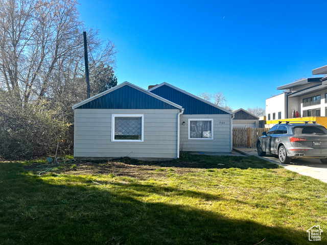 View of front of home featuring a front yard