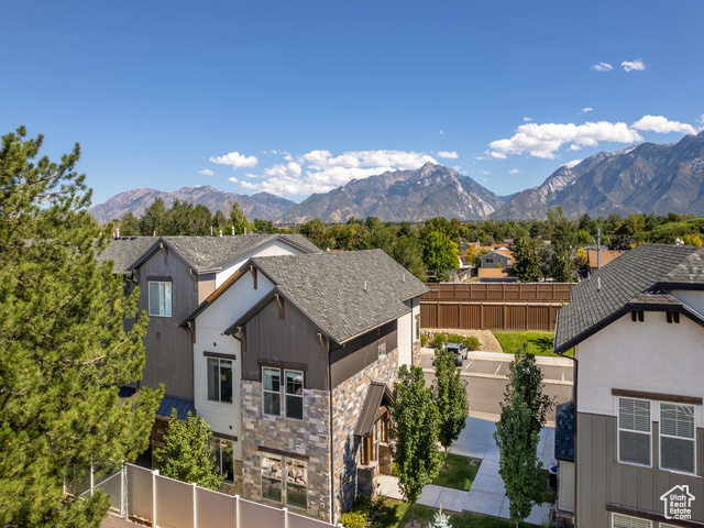 Experience luxury living in this stunning mountain modern townhome, the premier unit in the complex. Close to shopping and dining with stunning mountain views. Featuring top-of-the-line upgrades throughout, no detail has been overlooked- from sleek, contemporary finishes to designer details. The spacious, open-concept layout flows effortlessly, making it perfect for entertaining or relaxing in style. Oversized windows flood the space with natural light. Community pool, access to Sandy City trail system and Dimple Dell Regional Park. Conveniently located near everything that Sandy/Draper has to offer. 5-minute drive to a TRAX station in either direction Or a short distance with a dedicated trail. Easy access to the Cottonwood Canyons for all of your outdoor fun. Perfect for full or part time owners as the HOA maintains the exterior and provides landscaping and snow removal service. Washer/Dryer and Fridge are negotiable.