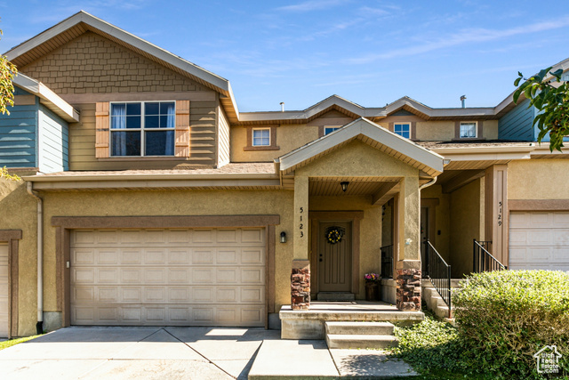 View of front of house with a garage