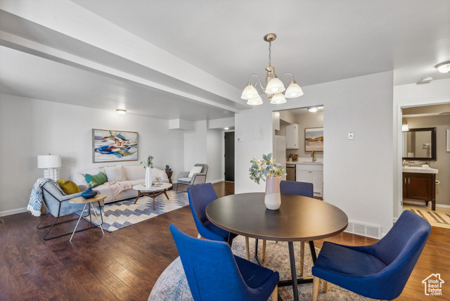 Dining space with a contemporary chandelier