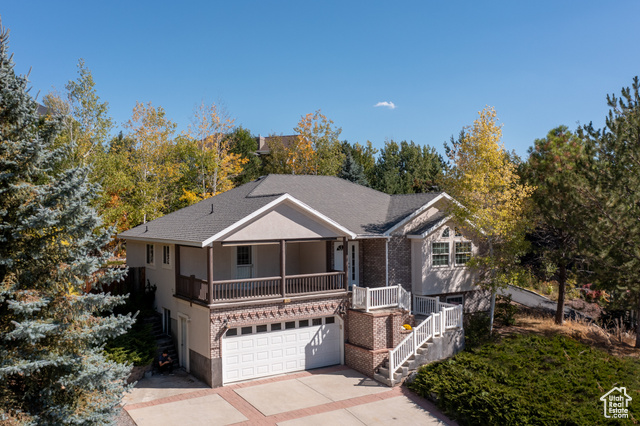 View of front of property with a garage