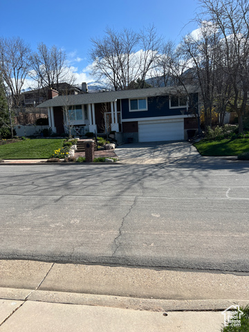 Single story home featuring a garage