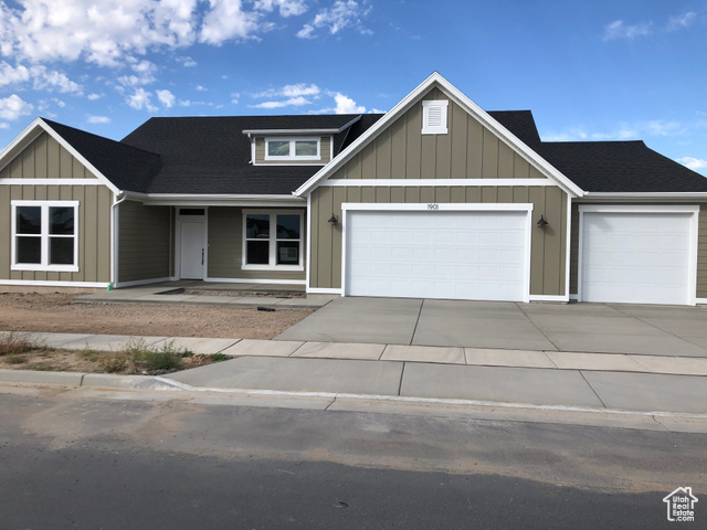 View of front of home with a garage