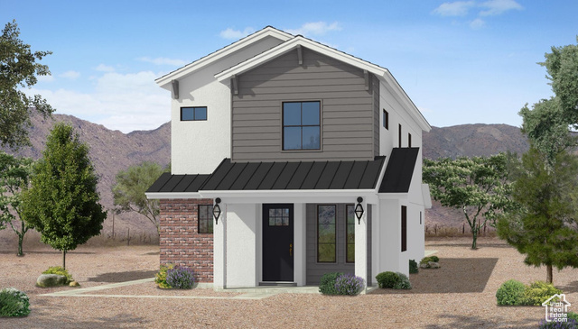 View of front of home with a mountain view