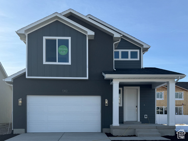 View of front facade with a garage