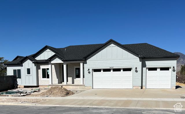 View of front of home featuring a garage