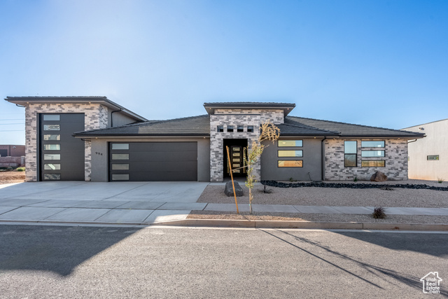 Prairie-style home with a garage