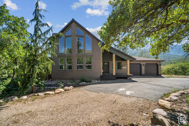 View of front of home featuring a garage