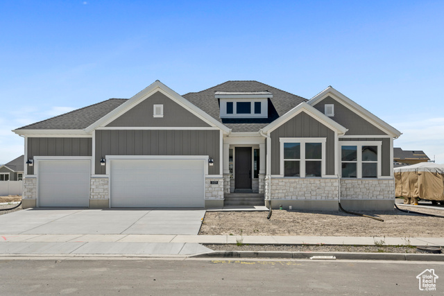 View of front of home featuring a garage