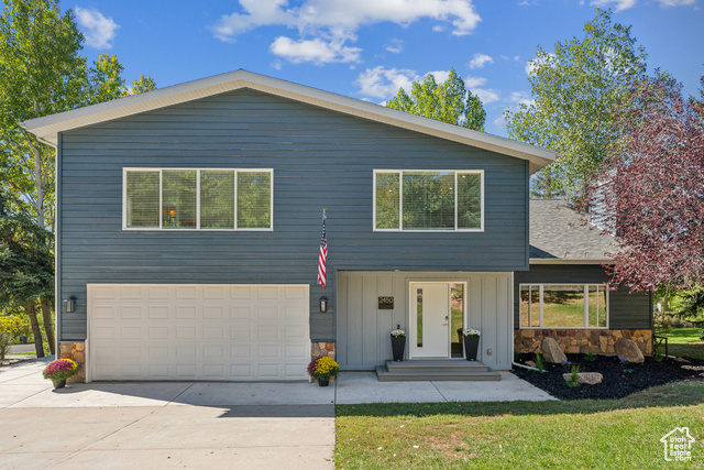 View of front of house with a garage