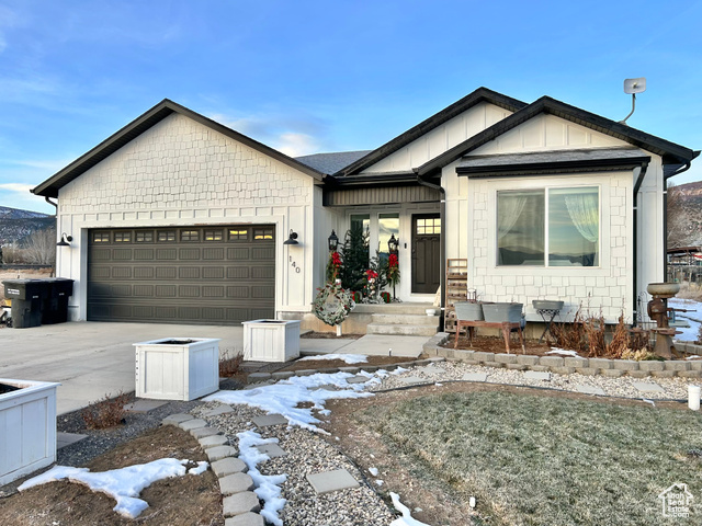 View of front of house with a garage