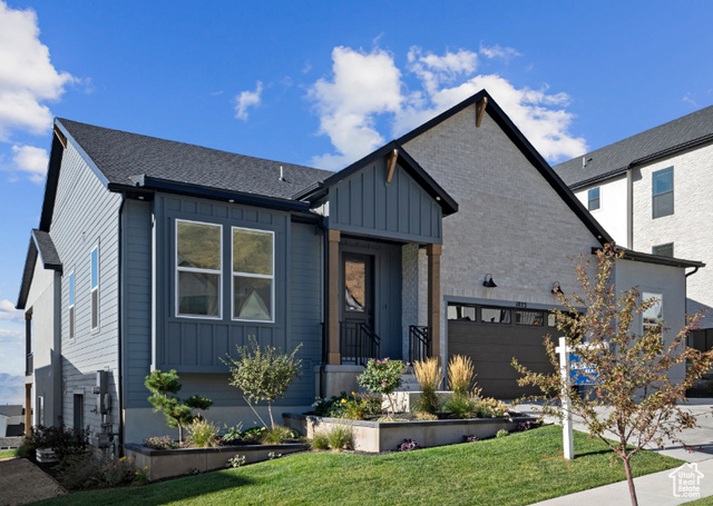 Come check out this pristine rambler with views that will leave you speechless! This upscale Canyon Point home at the peak of Traverse Mountain is an absolute dream home with main level living, a walkout fully finished basement, with second master suite, laundry and plumbing for a future kitchenette. This home includes a timeless farmhouse elevation, huge 2 1/2 car garage, sprawling finished basement for entertaining, main floor living with master on main, fireplace, enlarged windows, 8' tall sliding glass doors, quartz counters, gourmet Kitchenaid appliances including 36" gas cooktop with pot filler, stainless steel vented hood, double ovens, built in microwave, slow close cabinetry to the ceiling, and stunning valley views with a fully finished yard! This home is located within the Traverse Mountain community and includes a huge luxury clubhouse for community events, an amazing beach entry pool with lap swimming area, tennis courts, basketball courts, multiple parks and an extensive trail system leading directly into the canyon in your back yard!