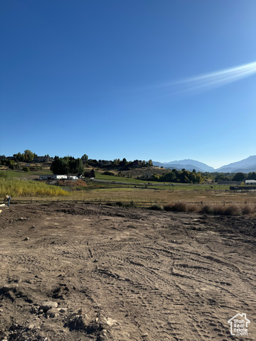 View of mountain feature with a rural view