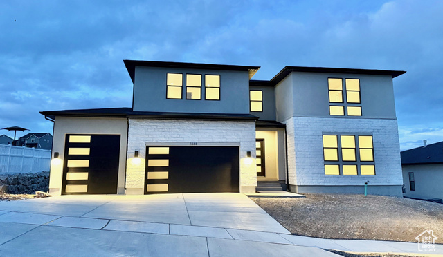 Contemporary home featuring a garage