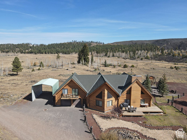 Drone / aerial view featuring a mountain view