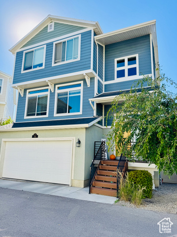 View of front of home with a garage