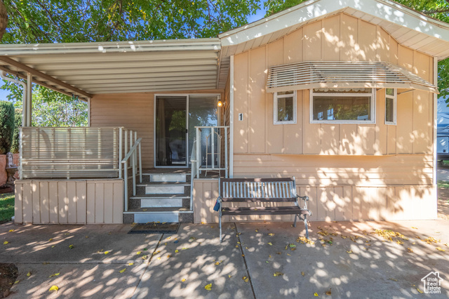 View of front of house with a patio