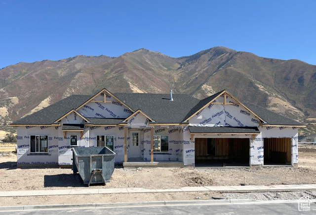 Property under construction with a mountain view