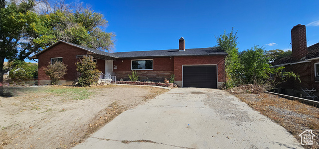 Ranch-style house with a garage