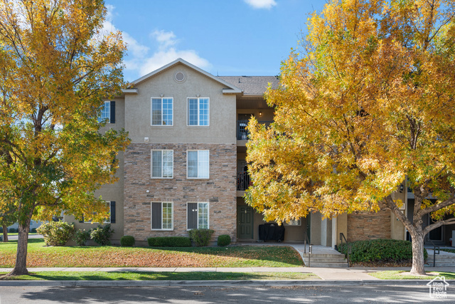 View of front of property with a front yard